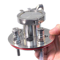 Universal Apollo Stainless Steel Pressure Lid with 2 inch Tri Clover Port shown in hand